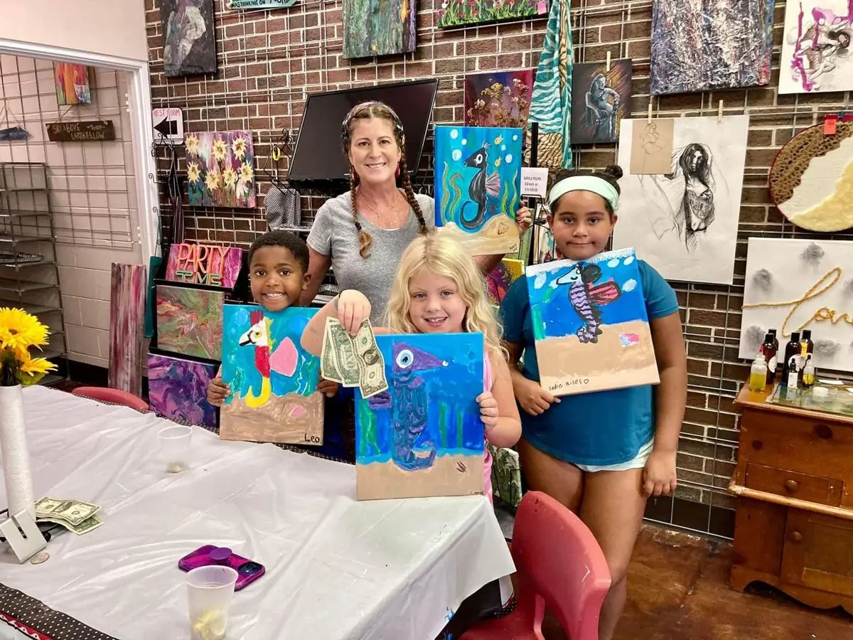 Kids' painting class inside the gallery
