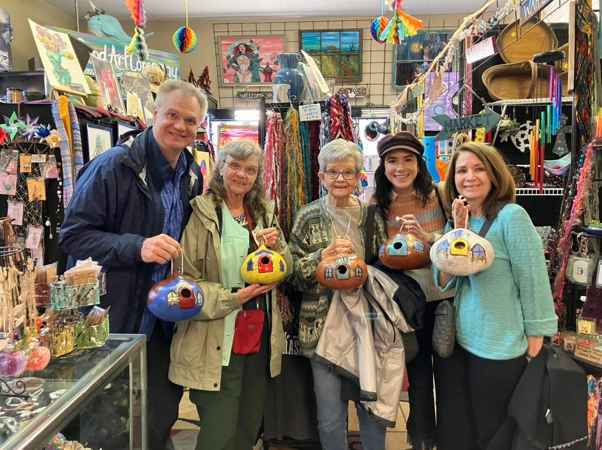 Shoppers with their finds inside the gallery